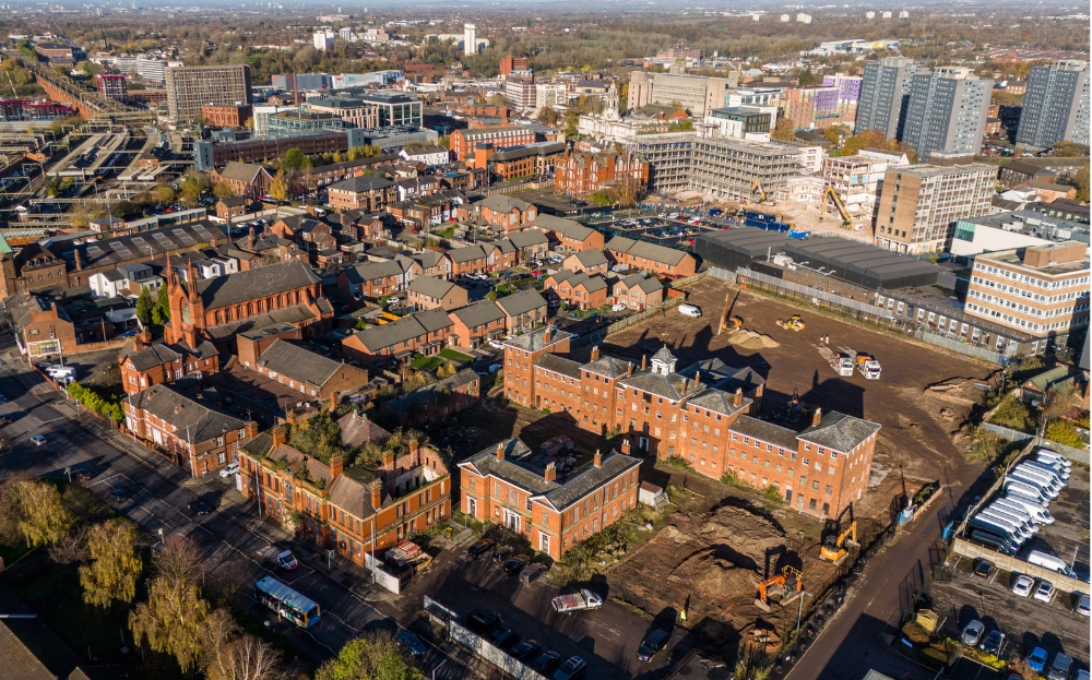 A bird's eye view of the development showing cleared land
