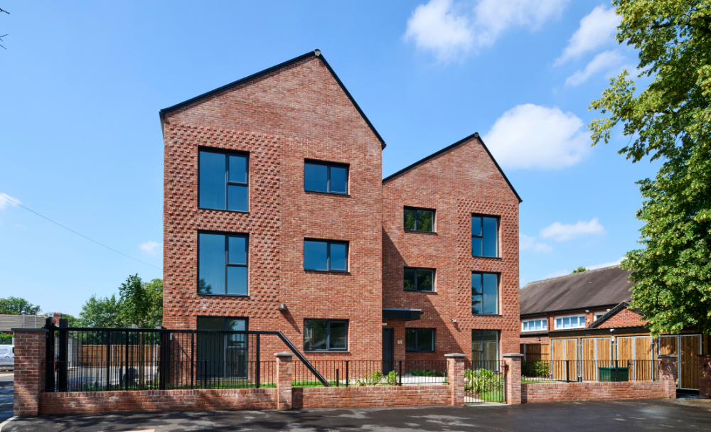 A new redbrick double fronted block of apartments 